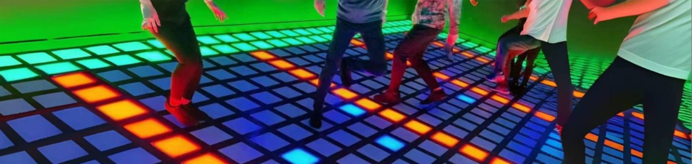 Players walking across a full-colour interactive LED floor